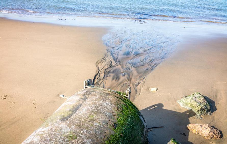 Water spilling onto beach